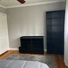 Photo 2: View of dresser & shelving space in bedroom