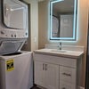 Photo 2: Washer and Dryer in unit