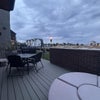 Photo 7: 2nd story balcony with lounger, table/chairs & gas grill