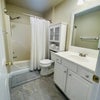 Photo 9: Downstairs Bath - Upstairs is the same 
