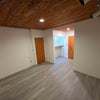 Photo 8: Downstairs bedroom with patio access