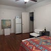 Photo 2: Room includes a fridge