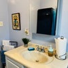 Photo 4: Main bathroom with tub & shower.