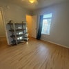 Photo 4: Bedroom 1 (no shelves or curtains)