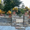 Photo 9: This is the outside entertainment area with fountain and fire pit