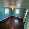 Photo 5: Large Bedroom.