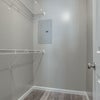Photo 3: Master bedroom walk-in closet