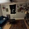 Photo 3: Living room (and goose)