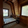 Photo 2: The slightly larger of the two rooms. Shown with optional queen frame. (Mattress available, too.)