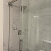 Photo 4: Hall bath, new tile
