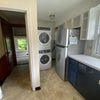 Photo 3: Pantry and washer/dryer