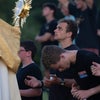 Photo 4: Adoring the Eucharist
