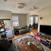 Photo 6: Living room w/ in unit w/d