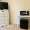 Photo 5: Microwave Smart Tv Refrigerator 