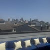 Photo 4: Downtown view from roof top terrace with patio set for up to 8 with fire pit and TV 