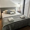 Photo 6: queen-size bed and private bathroom