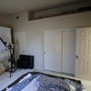Photo 4: Room is 10 feet 10 inches by 15. 02 feet long.