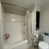 Photo 4: Large shower & cabinets 