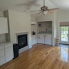 Photo 3: fireplace and laundry 