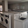 Photo 8: One.of two laundry rooms