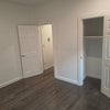Photo 4: Large Room. About 13x13 with a decent closet. Freshly painted.