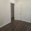 Photo 5: Small bedroom. About 10x9. One window that still gets a good amount of light into the room. Freshly 