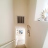 Photo 5: Stairs down to kitchen and living