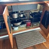 Photo 8: Kitchenette includes crock pot, pots/pans, storage and bakeware