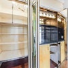 Photo 8: Mirrored hallway closet and bar closet