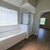 Photo 4: Bath tub, shower and toilet