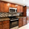 Photo 6: Galley style kitchen area 