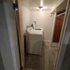 Photo 6: Shared Laundry outside of the unit