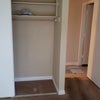 Photo 4: one side of large closet and door to hall