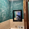Photo 8: Half bathroom on 1st floor with chalkboard wall