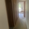 Photo 4: Hallway with storage space available