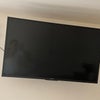 Photo 7: Large Screen Wall-Mounted TV