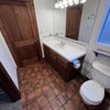 Photo 4: Primary bathroom towards side door