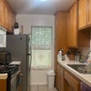 Photo 7: Kitchen w/electric stove,fridge,toaster oven, microwave 
