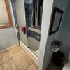 Photo 6: Shower and toilet