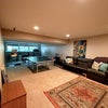 Photo 8: shared rec room (TV on wall not shown)