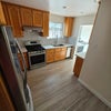 Photo 9: Kitchen/Laundry room