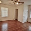 Photo 4: Primary bedroom with balcony access