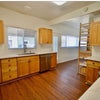 Photo 8: Kitchen with backyard access