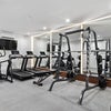 Photo 3: Apt gym