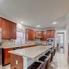 Photo 8: Large fully stocked kitchen