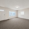 Photo 4: Shared living room — furnishings coming