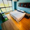 Photo 1: Your Bedroom with Smart HD TV, Small Fridge, Closet, Dressers