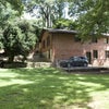Photo 3: Side yard, parking, stairs to patio