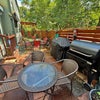 Photo 3: Stone Patio with Traeger Grill