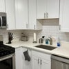 Photo 2: Gas range kitchen